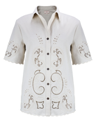 White blouse with decorative patterns on a white background Calling June